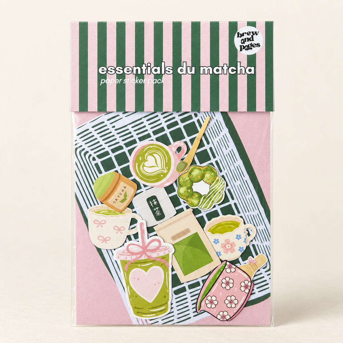 Essentials du Matcha paper sticker pack in pink and green packaging on an ivory background.